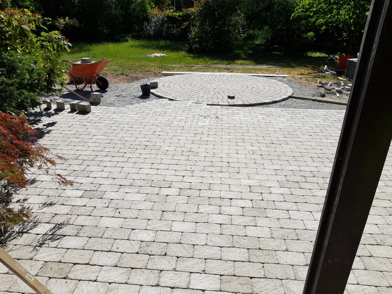 several cranes above the buildings